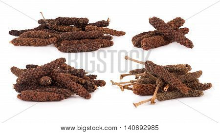 Closeup long pepper on white background. food