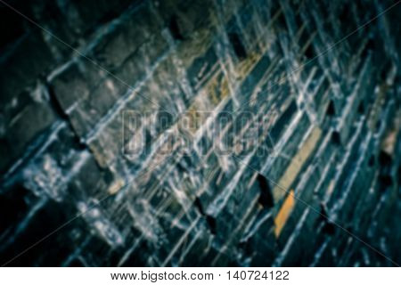 blury stone wall with waterfall dark tone color