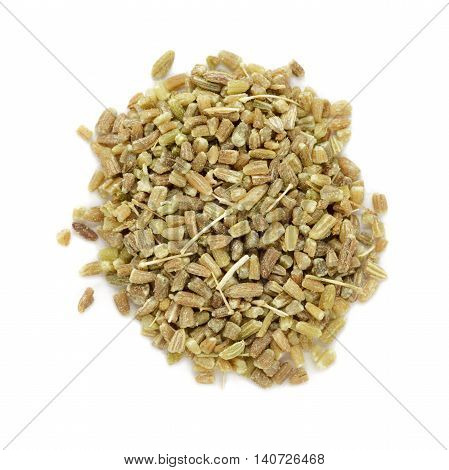 Organic fennel (Foeniculum vulgare) in tea cut size. Isolated on white background. Macro close up. Top view.