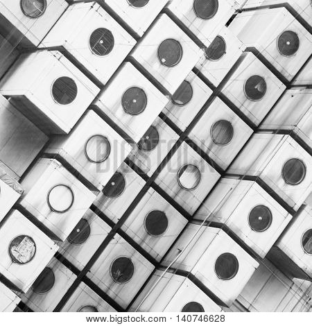 TOKYO, JAPAN - 22 JUNE 2016: The iconic Nakagin Capsule Tower in Shimbashi,Tokyo. Built in 1972 designed by Kisho Kurosawa and a rare surviving example of Japanese Metabolism style. Black and white.