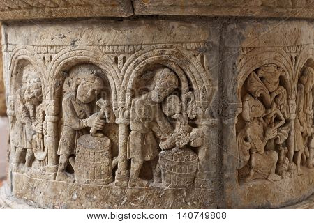 Ancient medieval sculpted crafts stone water well in Roc de Sant Gaieta Tarragona Spain.