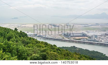 HONG KONG - MAY 26: A view of Chek Lap Kok Hong Kong International Airport from the Ngong Ping 360 cable car on May 26 2016 in Hong Kong.
