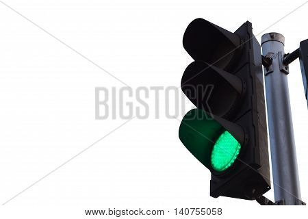 green color on the traffic light isolated on white background.