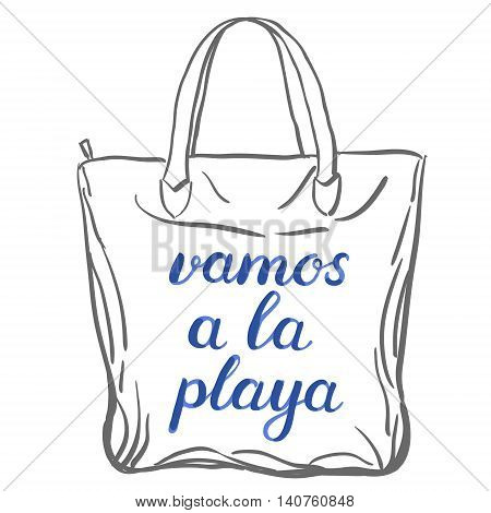 Vamos a la playa. Let s go to the beach in Spanish. Brush hand lettering on a sample tote bag. Great for beach tote bags, swimwear, holiday clothes, and more.