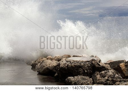 Breaking waves on rocks on the Adriatic Sea.