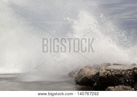 Breaking waves on rocks on the Adriatic Sea.