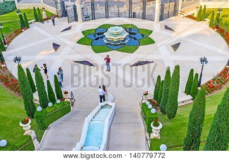 HAIFA ISRAEL - FEBRUARY 20 2016: The wedding photo session in lower Bahai Gardens on February 20 in Haifa.