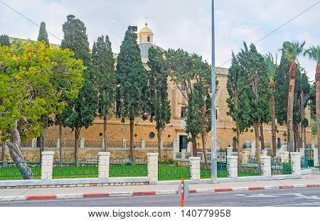 The Stella Maris Monastery located on Mount Carmel and surrounded by green garden Haifa Israel.