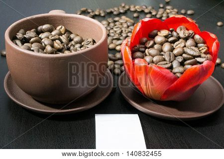 coffee beans in the bud red flower, paper with your signature.