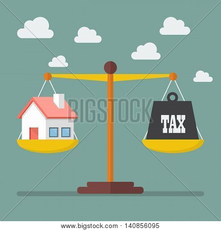 House and Tax balance on the scale. Business Concept