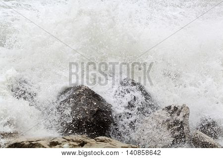 Waves breaking on rocks at the Adriatic Sea.