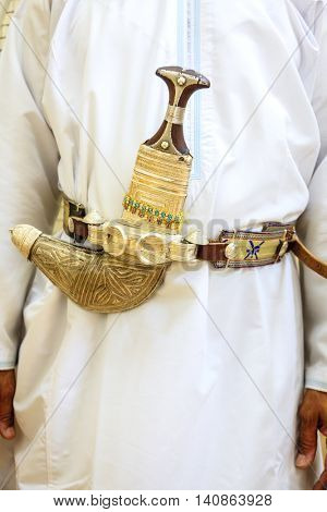 Traditional Omani dagger on a belt - khanjar is hand made from finest silver