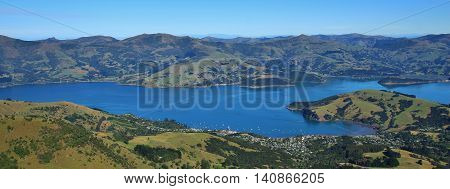 Akaroa Harbour and farmland. Scene on the Banks Peninsula New Zealand.