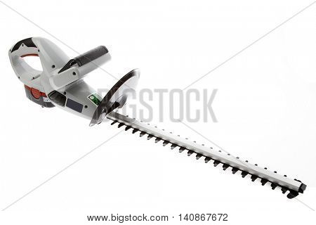 New cordless hedge trimmer isolated on plain background