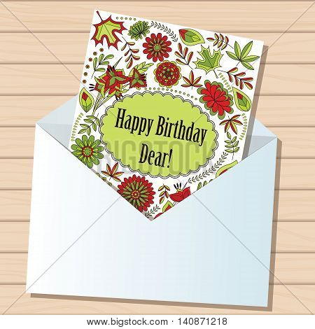 Vector happy birthday dear card in envelope on wooden background