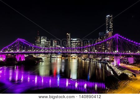 BRISBANE, AUSTRALIA: Story Bridge and cityscape by Night - magenta lights