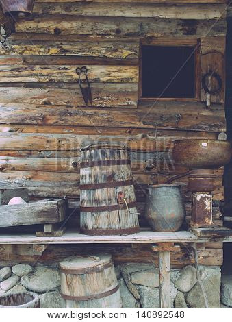 Old wooden house with tolls and wooden equipment