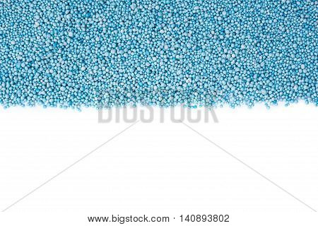 Top View Of Pattern Blue Urea Fertilizer Isolated On White