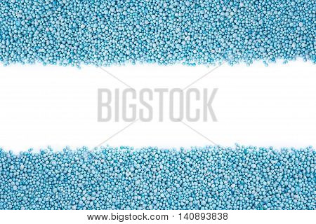 Top View Of Pattern Blue Urea Fertilizer Isolated On White