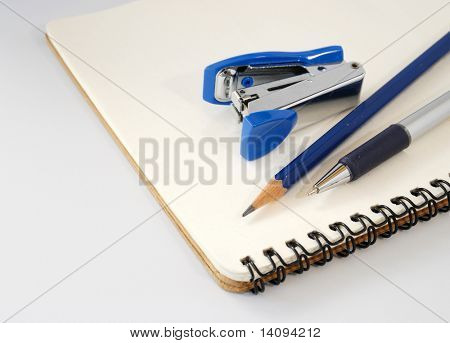 Notepad and pen,Blue stapler