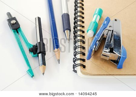 Notepad and pen,Blue stapler
