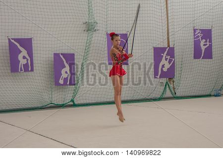 Warsaw Poland - June 25 2016: A gymnast with the jumping rope
