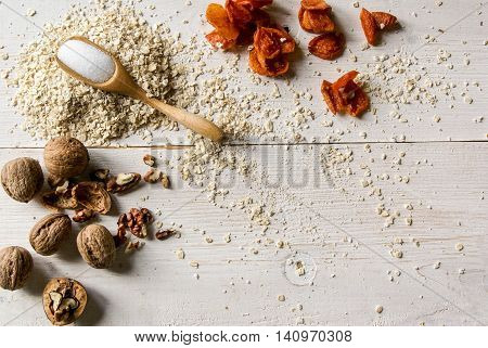 Ingredients for dietary recipe oatmeal cookies: oatmeal, erythritol (erythritol), dried fruits, nuts. Copy space