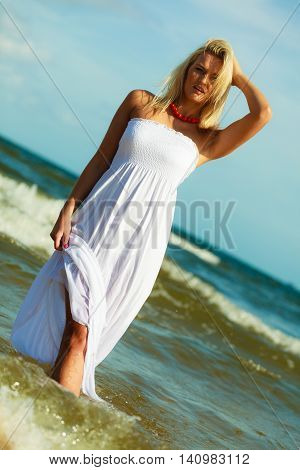 Young Woman Chilling Out On The Beach.