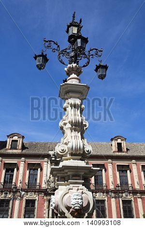 Detail of the water fountain in front of the Archbishop Palace at Plaza Virgen de los Reyes in Seville Spain