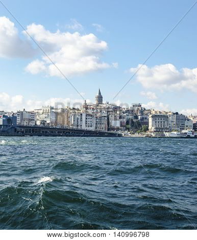 Istanbul Turkey. Galata Bridge and Galata Tower in the background Istanbul views. This is a great place to see the colors of Istanbul at . Interesting to see the fishermen on the bridge with the Galata tower in the background. There are lots of restaurant