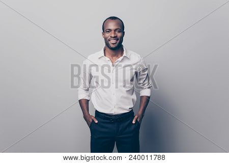 Portrait Of Glad Confident Intelligent Attractive African Man Wearing White Shirt With Rolled-up Sle