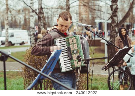 Russia, Siberia, Novokuznetsk - May 9, 2017: Musicians Sing Songs On The Street On Victory Day