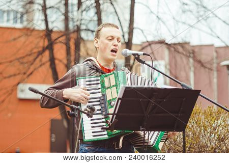 Russia, Siberia, Novokuznetsk - May 9, 2017: Musicians Sing Songs On The Street On Victory Day