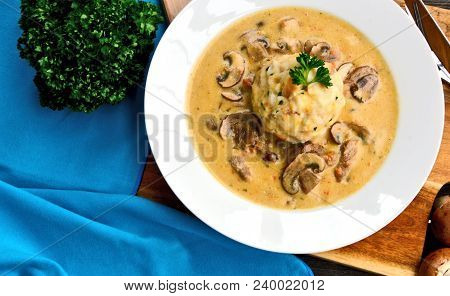 Sour Mushroom Sauce With Bread Dumpling (german Name Is Saure Schwammerlso