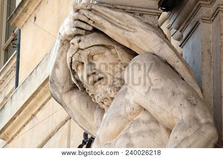MANTUA, ITALY - JUNE 04: Statue of Hercules at the entrance to the 18th century Palazzo Vescovile (Bishops Palace) in the historical center of Mantua, Italy on June 04, 2017.