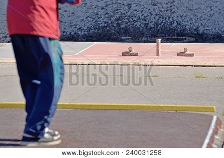 Gorodki - A Russian Folk Sports Game. In This Game You Need Specific Distances To Smash Figures Made