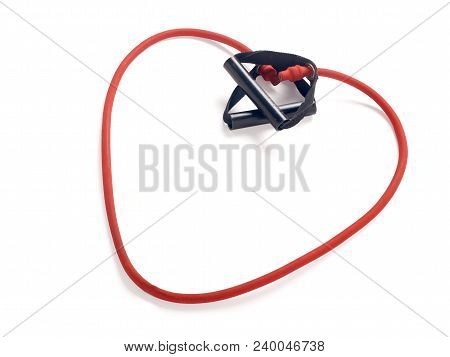Red Fitness Expander In The Form Of Heart On White Background