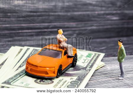 A Man Boasts Of His Wealth And Position In Front Of Another Person. Buying A New Car. Social Class I