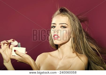 Portrait Of One Attractive Young Sensual Woman With Long Hair Bright Make-up And Naked Shoulders Hol