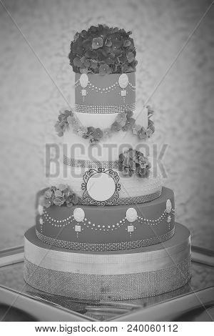One Large Beautiful Delicious Many-tier Decorated Wedding Cake White And Blue Colours With Flower Ga