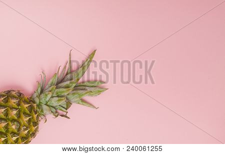 Half Cut Juicy Pineapple On A Pastel Pink Background. Minimal Summer Concept.