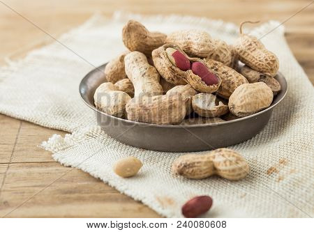 Peanut In Shell Texture And Background. Peanuts Texture. Shelled Peanuts. Healthy Food. Close Up Vie