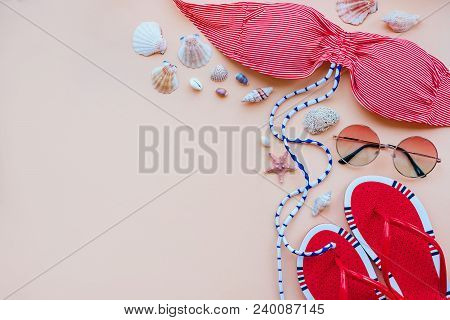 Summer Fashion Flatlay With Gradient Round Sunglasses, Flats And Red Striped Bikini Top. Decorated W