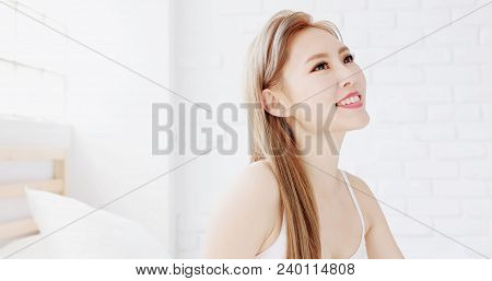 Woman Wake Up On Bed In The Morning