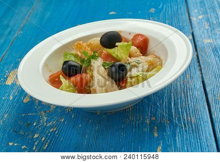 Esqueixada - Traditional Catalan Dish, A Salad Of Shredded Salt Cod, Tomatoes, Onions, Olive Oil And