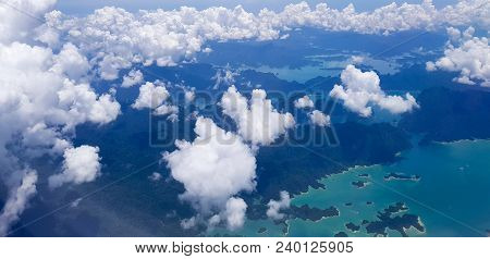 Nature background white clound and blue sky view from airplane windows