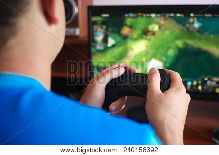 Man Hand Playing A Computer Games. Dependence On Computer Games.