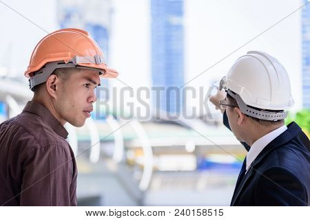 Two Asian Business And Engineer Man Has Planning And Working For Design Buiding And City.