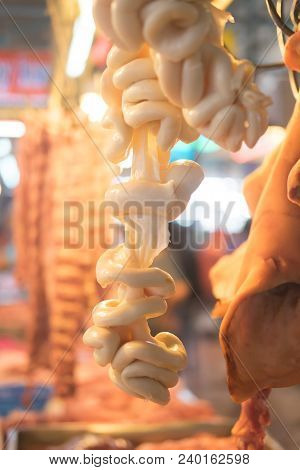 Chitterlings Internal Organs Of Pig Hanging In The Fresh Market