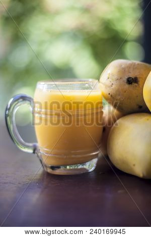 Popular Indian Asian Sweet Dessert Dish Eaten At The Time Of Lunch ‘aam Ras’ Juice Of Kesar Kair Wit